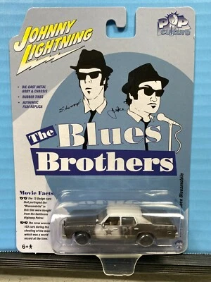 1/64 JOHNNY LIGHTNING THE BLUES BROTHERS 1974 DODGE MONACO THE BLUESMOBILE BLACK - Image 1 of 2