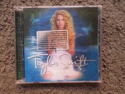 TAYLOR SWIFT "TAYLOR SWIFT-DELUXE" 2007 BIG MACHINE CD+DVD W/LENTICULAR-PROMO #2 - Image 1 of 4