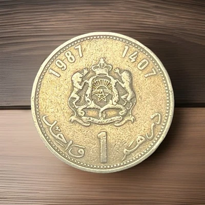 1987 Morroco 🇲🇦 ONE (1) Dirham Coin (KING HASSAN II) Free Shipping In The US - Image 1 of 2