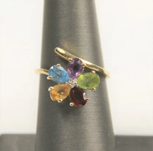 ANILLO FLOR ORO AMARILLO 10KT Y MÚLTIPLES PIEDRAS PRECIOSAS TALLA 6,75 - Imagen 1 de 5