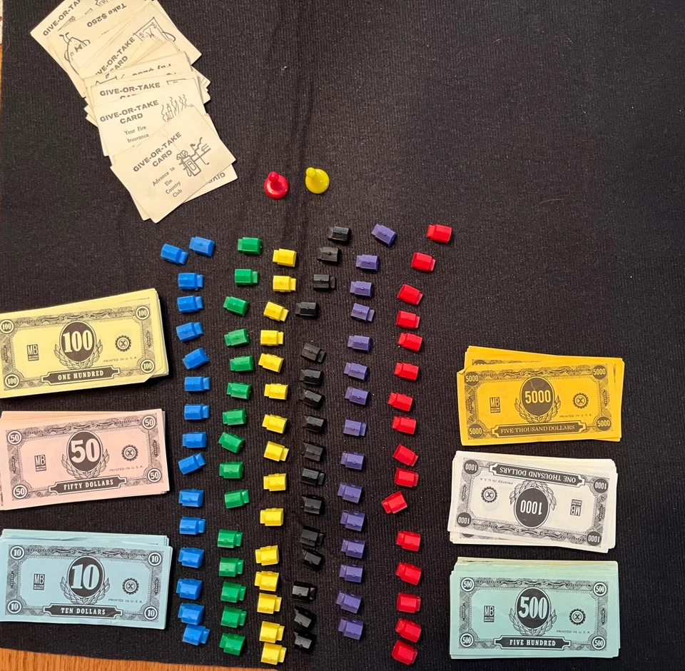 Piezas de juego de dinero fácil, casas, dinero, tarjetas de dar o recibir, usadas Foto 1 de 1