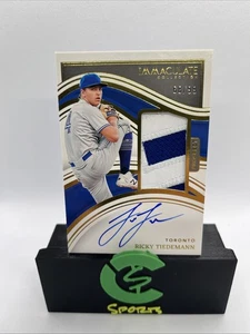 Parche automático Panini Immaculate Ricky Tiedemann Prospect 2023/99 Blue Jays - Imagen 1 de 2