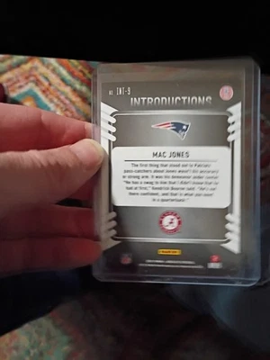 2021 Panini Absolute - Introductions Mac Jones #INT-9 (RC) - Image 1 of 2