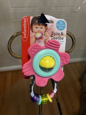 Sonajero de flores gomosas Infantino nuevo Spin & Teethe Foto 1 de 4