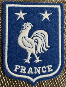 ECUSSON ÉQUIPE DE FRANCE CHAMPIONNE DU MONDE. 2 ETOILES. (ECU 91) - Picture 1 of 2