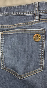 Pantalones de mezclilla elásticos de tiro bajo de pierna recta Tory Burch. Leggings vaqueros. El color - Imagen 1 de 10