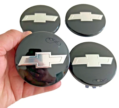 Tapa central de rueda Chevy negra 4 piezas emblema cromado para Chevrolet Silverado Tahoe 14+ Foto 1 de 3