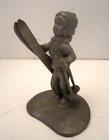 Vintage jeb pewter figurine Vail Skier Boy. Metal holding Skis. 3" tall.