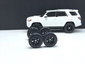 R352 Hot Wheels 1/64 Real Riders TE37 schwarz 4x4 Offroad Gummiräder - Bild 1 von 3
