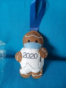 2020 Felt Gingerbread Man Christmas Ornament mask holding toilet paper New - Picture 1 of 6