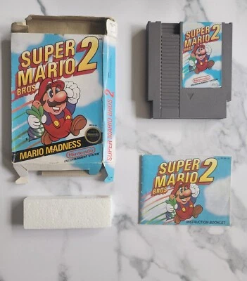 Super Mario Bros. 2 SMB2 - Circle Seal. Rev-A.  CIB NES. Authentic Tested Good - Image 1 of 4