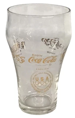 1976 Jogos Olímpicos Coca-Cola Letra Dourada 5 Idioma Copo de Vidro Refrigerante 5-1/2" - Imagem 1 de 3