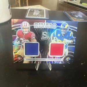 2023 Spectra Rivals Christian McCaffrey Aaron Donald Patch 19/75  Error Card! - Picture 1 of 3