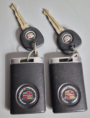 OEM Pair Cadillac 4 Button Keyless Remote Fob OUC6000066 Keyfobs - Image 1 of 4