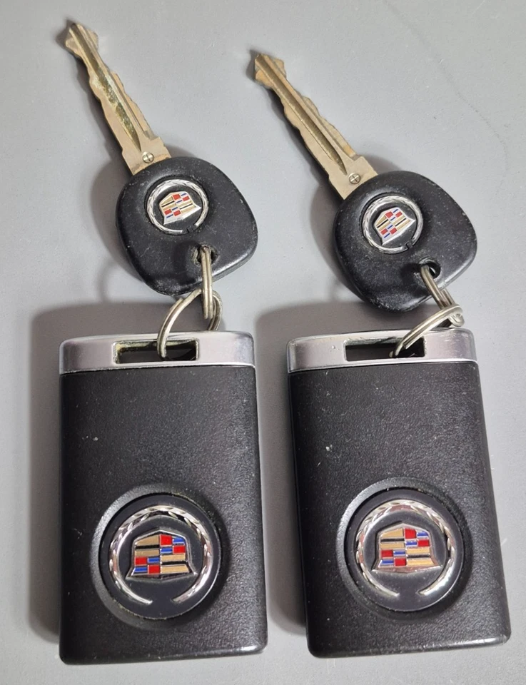 OEM Pair Cadillac 4 Button Keyless Remote Fob OUC6000066 Keyfobs - Image 1 of 4