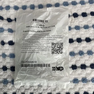 New in Package - DMP 1144-D Wireless Dual Button Key Fob - Picture 1 of 2