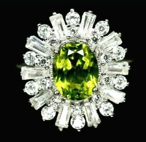 NATURAL 7 X 9 mm. ANILLO PERIDOTO VERDE OVALADO Y CIRCONITA BLANCA PLATA ESTERLINA 925 TALLA 5,75 - Imagen 1 de 3