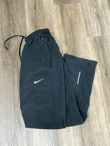 Nike Pants Mens Small Black Track Pants Windbreaker Tapered Zip Leg Stretch - Picture 1 of 6