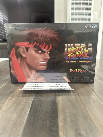 2023 SDCC Exclusive Street Fighter II Evil Ryu Jada Toys 6" Jada Toys In Hand Cover
