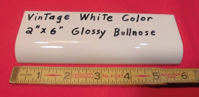 1 pc. Vintage White: Glossy 2" X 6" Ceramic Radius Bullnose Tile;  Mud Caps - Image 1 of 4