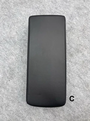 Reposabrazos asiento trasero Cadillac DTS 2006-2011 negro usado OEM Foto 1 de 4