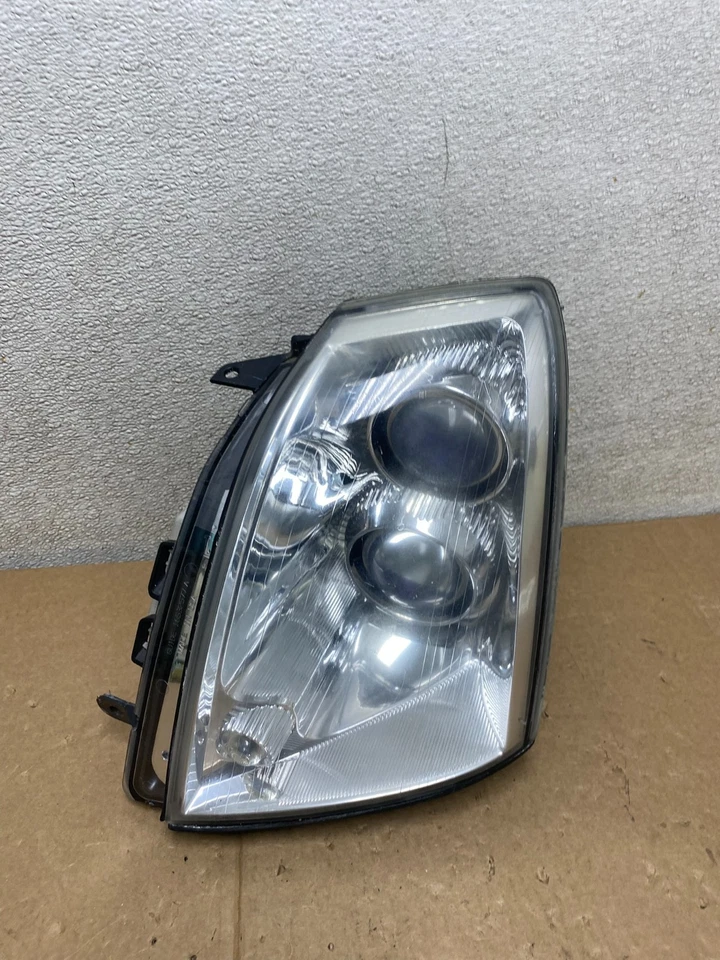 Левая ксеноновая фара левая со стороны водителя для Cadillac STS 2005–2011 годов от оригинального производителя U9830 DW - Изображение 1 из 4