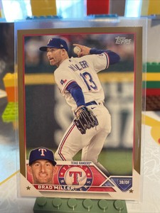 BRAD MILLER 2023 TOPPS SERIES 1 GOLD PARALLEL #0019/2023 RANGERS #319