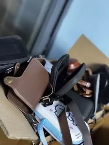 (Ordine con articoli in negozio) Servizio consegna espressa + borsa fotocamera - Foto 1 di 1