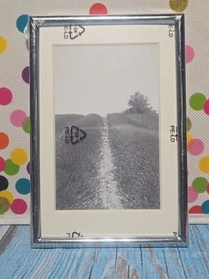 Marco de fotos de acero IKEA Guldboda 4x6 - elegancia metálica nuevo en paquete  Foto 1 de 2