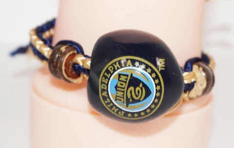 PHILADELPHIA UNION MLS - SINGLE KUKUI NUT + MACRAME BRAID BRACELET SOCCER FUTBOL Cover