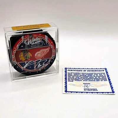 Disco de hockey autografiado por Kris Versteeg de los Chicago Blackhawks con certificado de autenticidad Foto 1 de 2