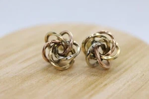 14k LOVE knot earring. Tricolor KNOT knotted gold earrings. - Picture 1 of 5