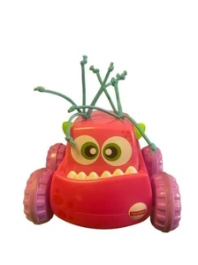 Fisher-Price rosa Monster Press & Go Spielzeugauto mit Wackelantennen & rollendem Rad - Bild 1 von 3