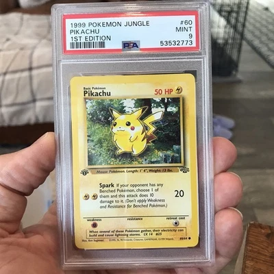 1999 Pokemon 1st Edition Jungle Pikachu 60/64 PSA 9  - Image 1 of 2