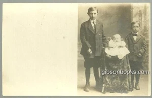 Two Boys Standing Baby in a Chair Vintage Unused Real Photo Postcard - Picture 1 of 1