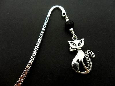 A TIBETAN SILVER & BLACK ONYX BEAD CAT THEMED BOOKMARK. NEW.