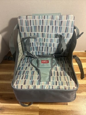 Asiento elevador Nuby Easy Go - Fácil de usar - Plegable y ligero - 9+ meses Foto 1 de 4