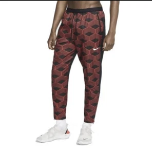 Neu mit Etikett Nike Team Kenya Shieldrunner Laufen Unisex Hose reflektierend Gr. Medium - Bild 1 von 12