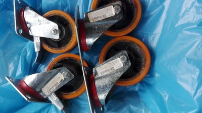 4 RUOTE PER CARRELLO GIREVOLI CON  FRENO E  PIASTRA NUOVE. - Immagine 1 di 2