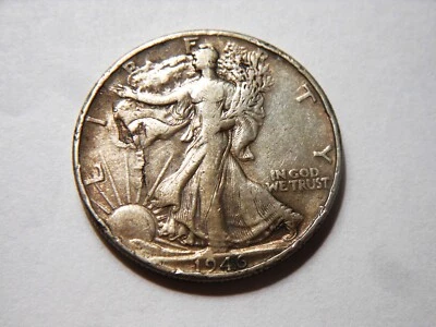 1946-P VF+ Silver Walking Liberty Half $ with a Retained Lamination Peel Error - Image 1 of 3