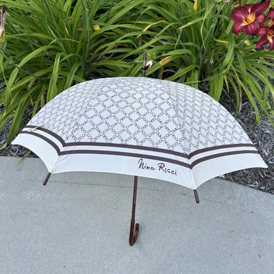 Paraguas vintage original Nina Ricci imitación madera mango Lucite con diseño de logotipo  Foto 1 de 4
