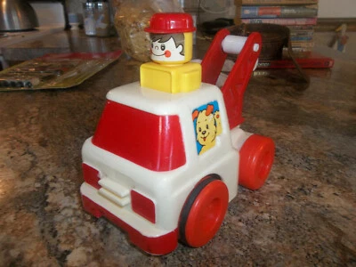 Vintage / Antique 1980 UNIMAX Tow Truck Plastic Pop Up Man  - Image 1 of 4