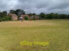 Photo 6x4 Ponies in field under a stormy sky The houses on the far side o c2012