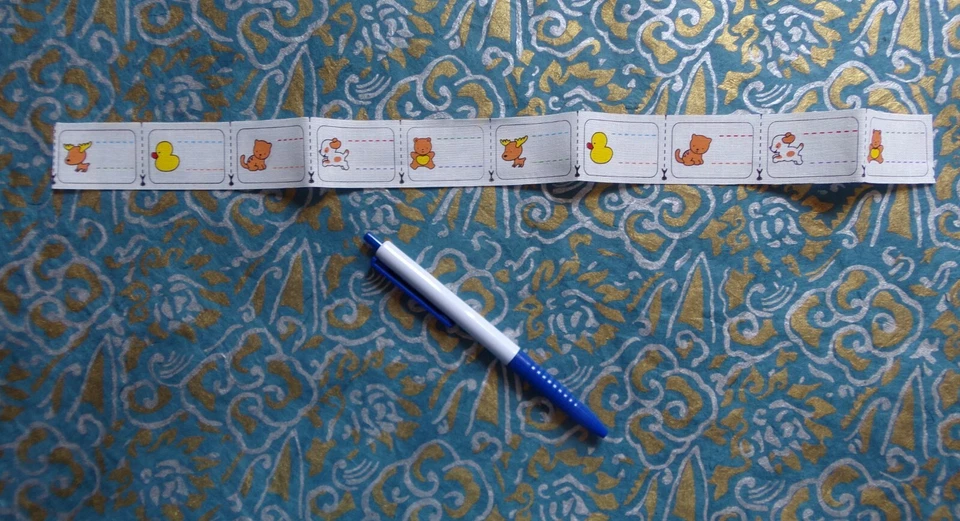 §  stylo marqueur + 10 étiquettes linge enfant  - Photo 1/1