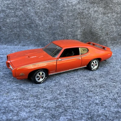 1/18 Ertl American Muscle 1969 Pontiac GTO Judge Orange Diecast - Missing Mirror - Image 1 of 4