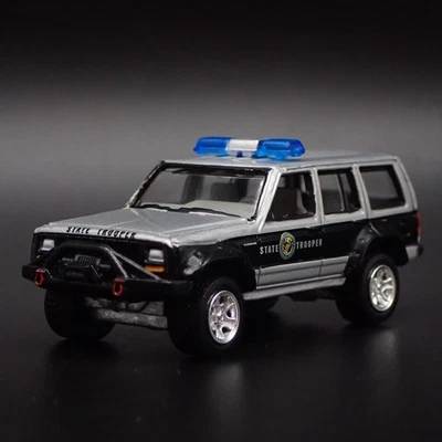 JEEP CHEROKEE XJ N. CAROLINA HIGHWAY PATROL POLICE 1:64 SCALE DIECAST MODEL CAR - Image 1 of 4