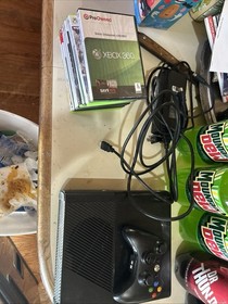 Microsoft Xbox 360 E Black 4GB with 8 games