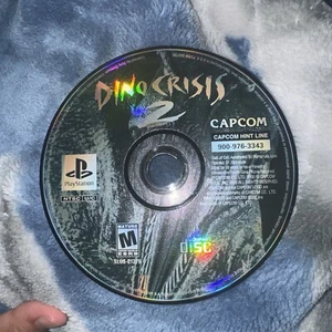 Dino Crisis 2 (Sony PlayStation 1, 2000) - Picture 1 of 3