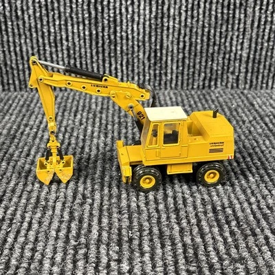 CONRAD 1/50 SCALE - LIEBHERR A 921 SERIES B EXCAVATOR GRIPPER MOBILE MODEL - Image 1 of 4