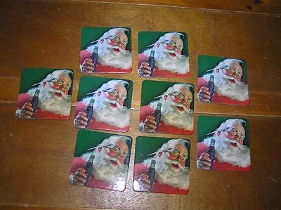 Lot of 8 Vintage Reproduction Santa Claus Drinking Coca-Cola Square Cork Backed  - Image 1 of 4